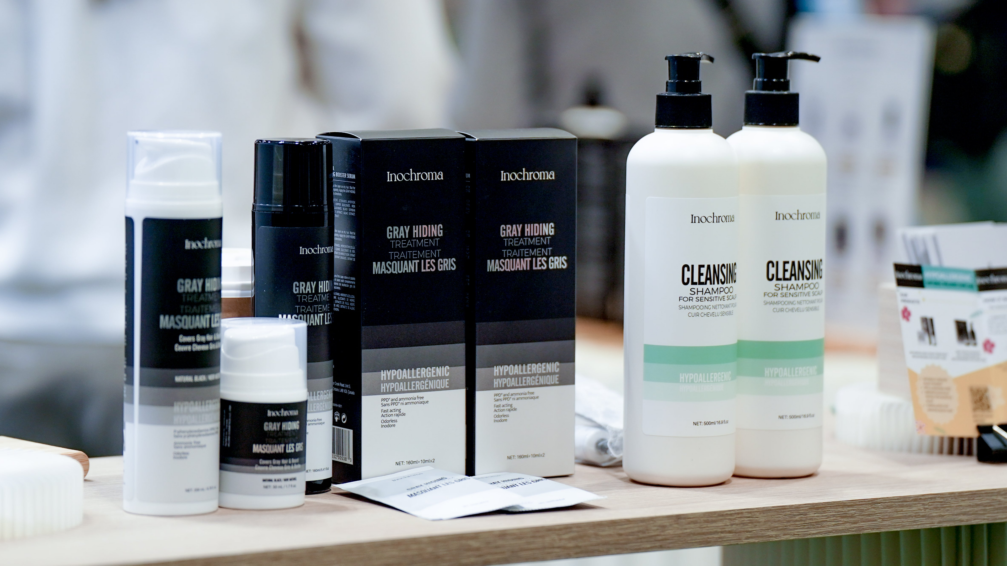 Boschmann hair care products on a wooden surface with a blurred background